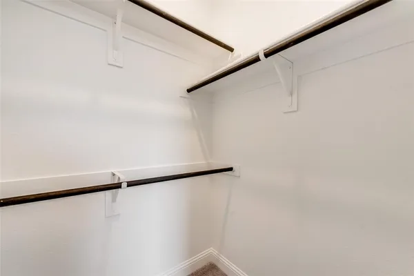 an empty room that has a window
