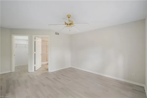 a bathroom with a double vanity sink toilet and shower