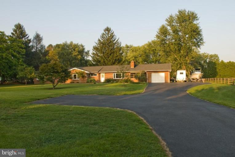 5618 Allender Road White Marsh, MD 21162 - Photo 1 of 19 a view of a house with a big yard