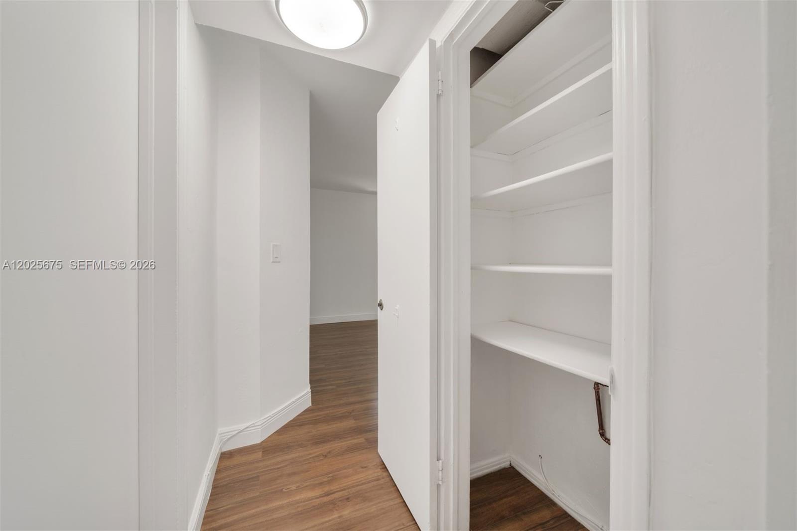 5605 Southwest 80th Street, Unit 10D Miami, FL 33143 - Photo 27 of 43 Hallway linen closet