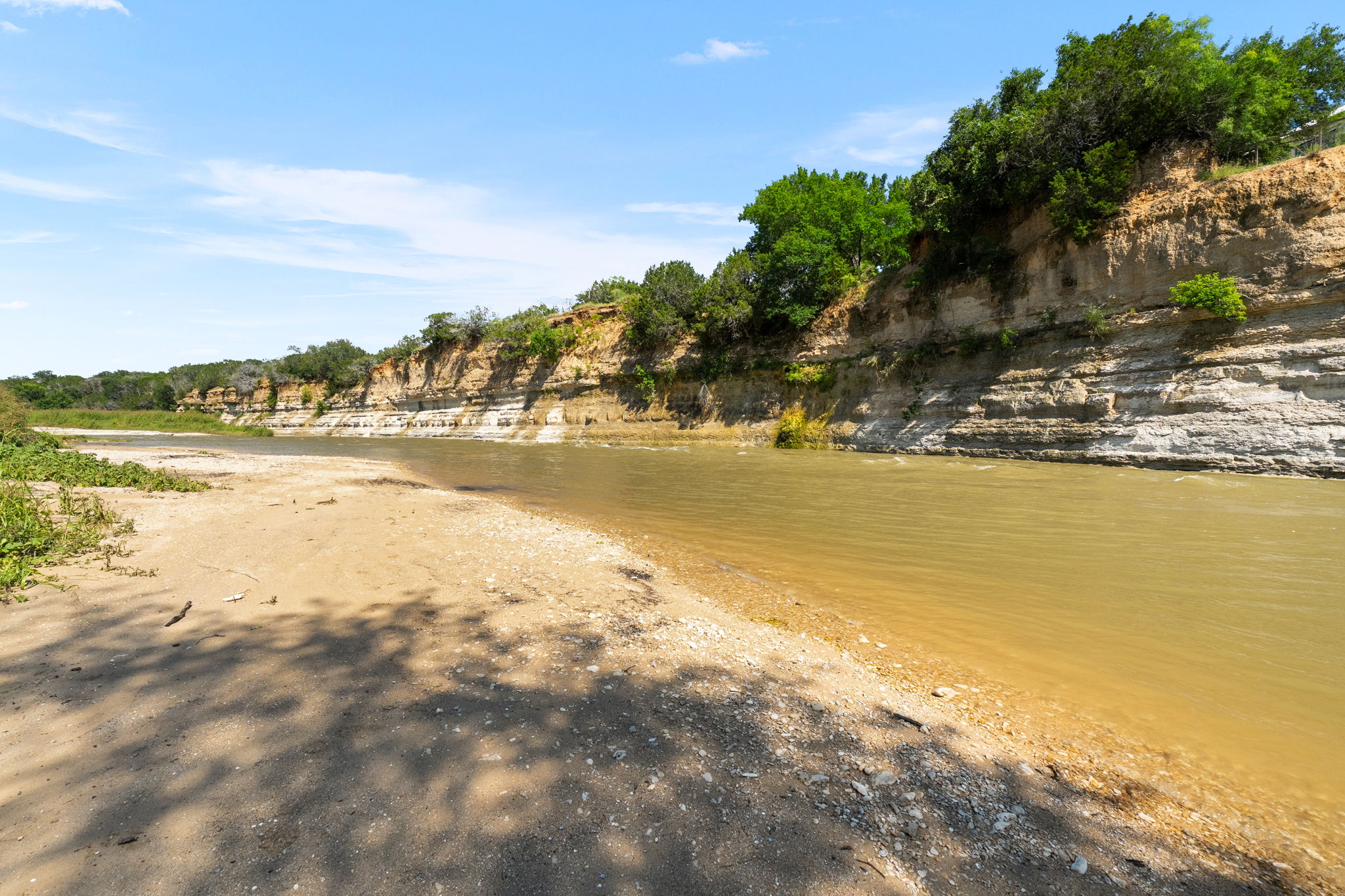 1427 River Ridge Ranch Road Killeen, TX 76549 - Photo 2 of 40 Your own private beach on the tranquil Lampasas river alongside a scenic rocky bluff crowned with verdant trees.