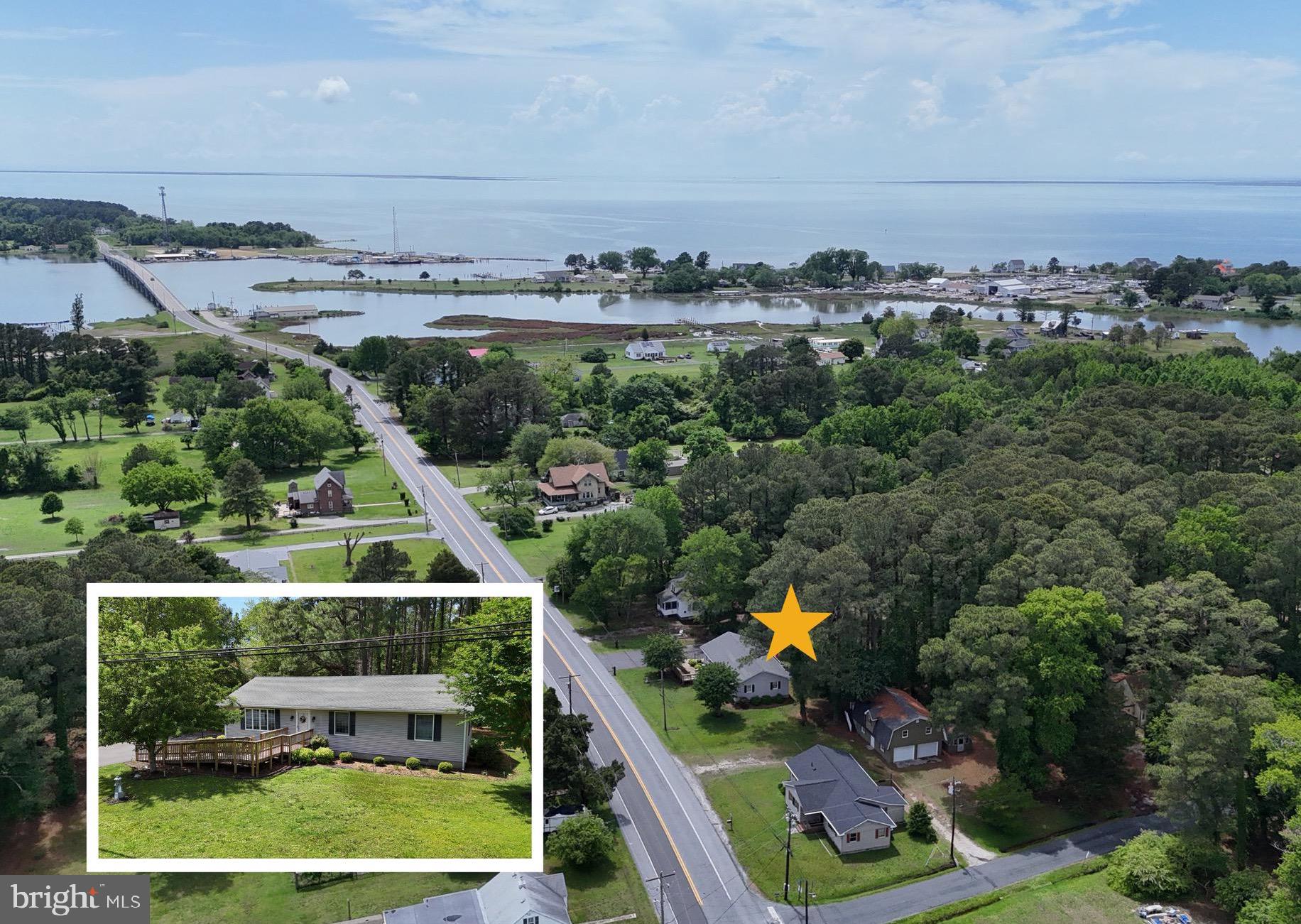 23488 Deal Island Road Deal Island, MD 21821 - Photo 1 of 52 an aerial view of multiple house
