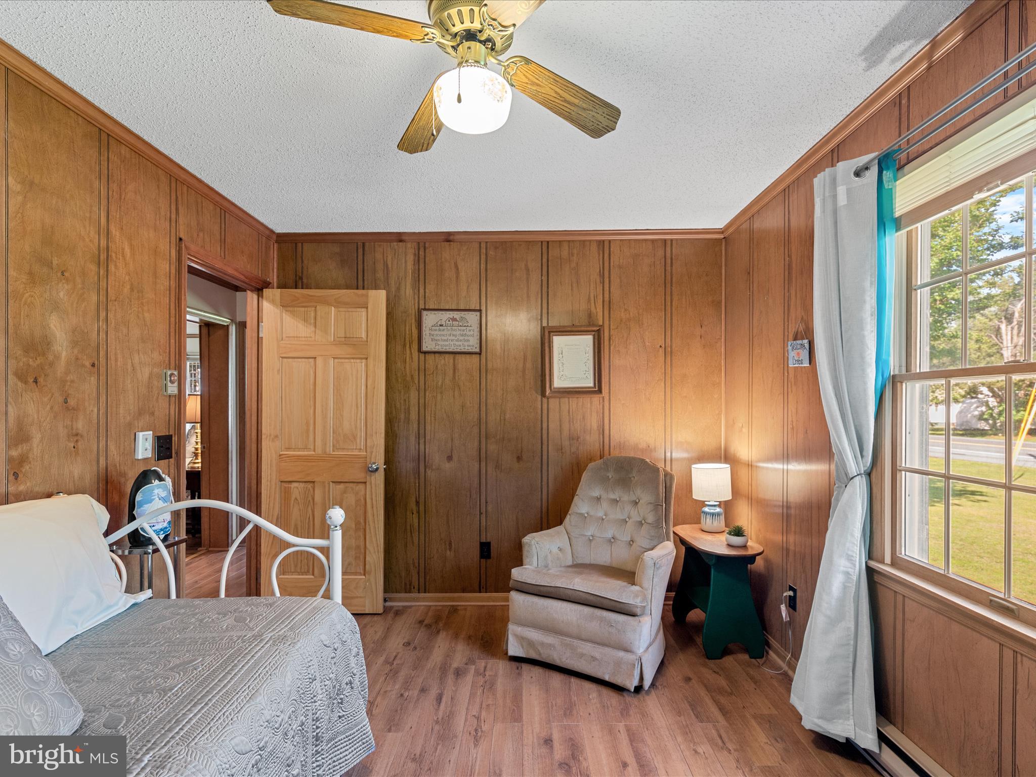 23488 Deal Island Road Deal Island, MD 21821 - Photo 25 of 52 a living room with furniture and wooden floor