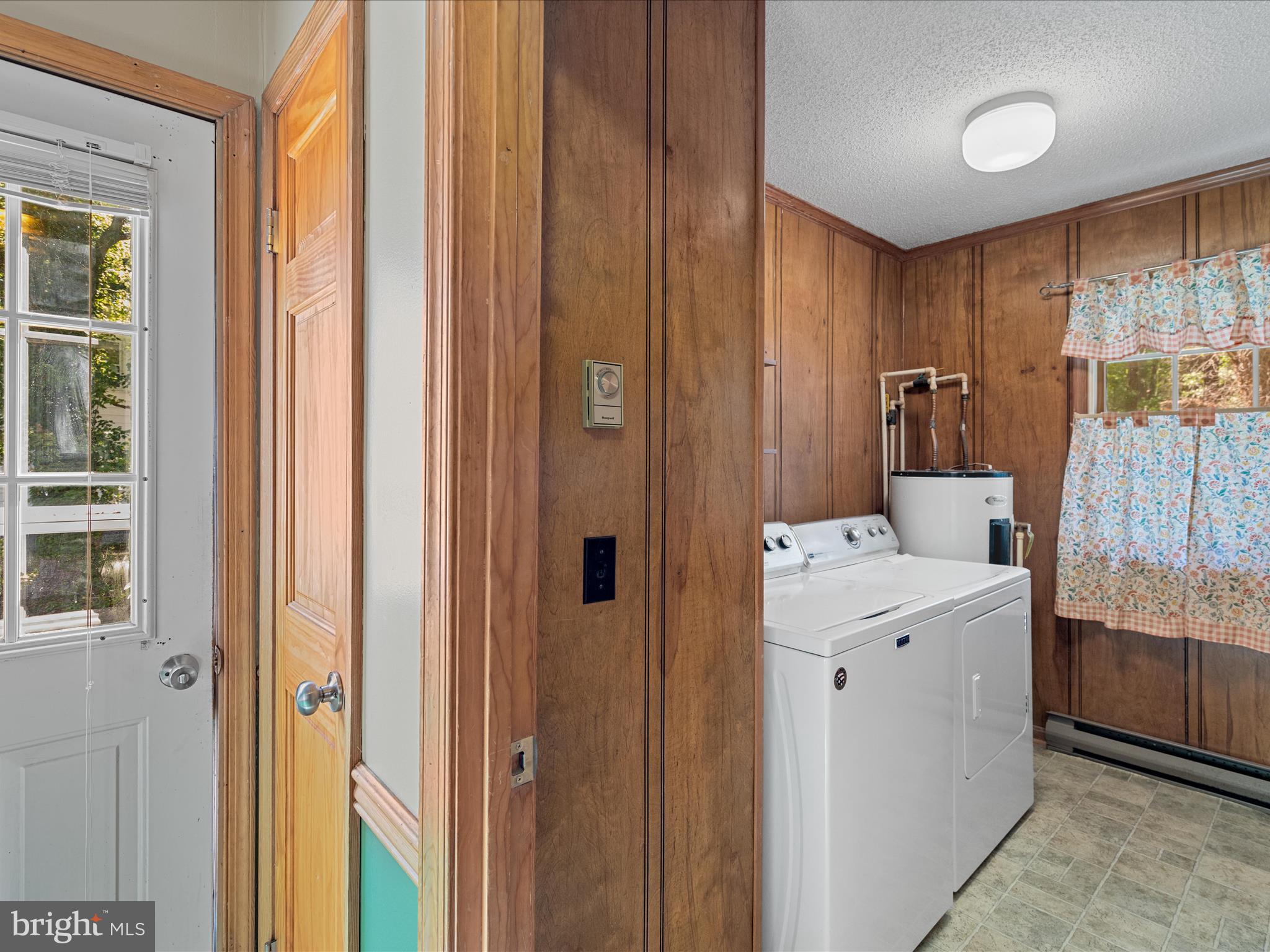 23488 Deal Island Road Deal Island, MD 21821 - Photo 27 of 52 a view of bathroom with a sink a mirror and a shower