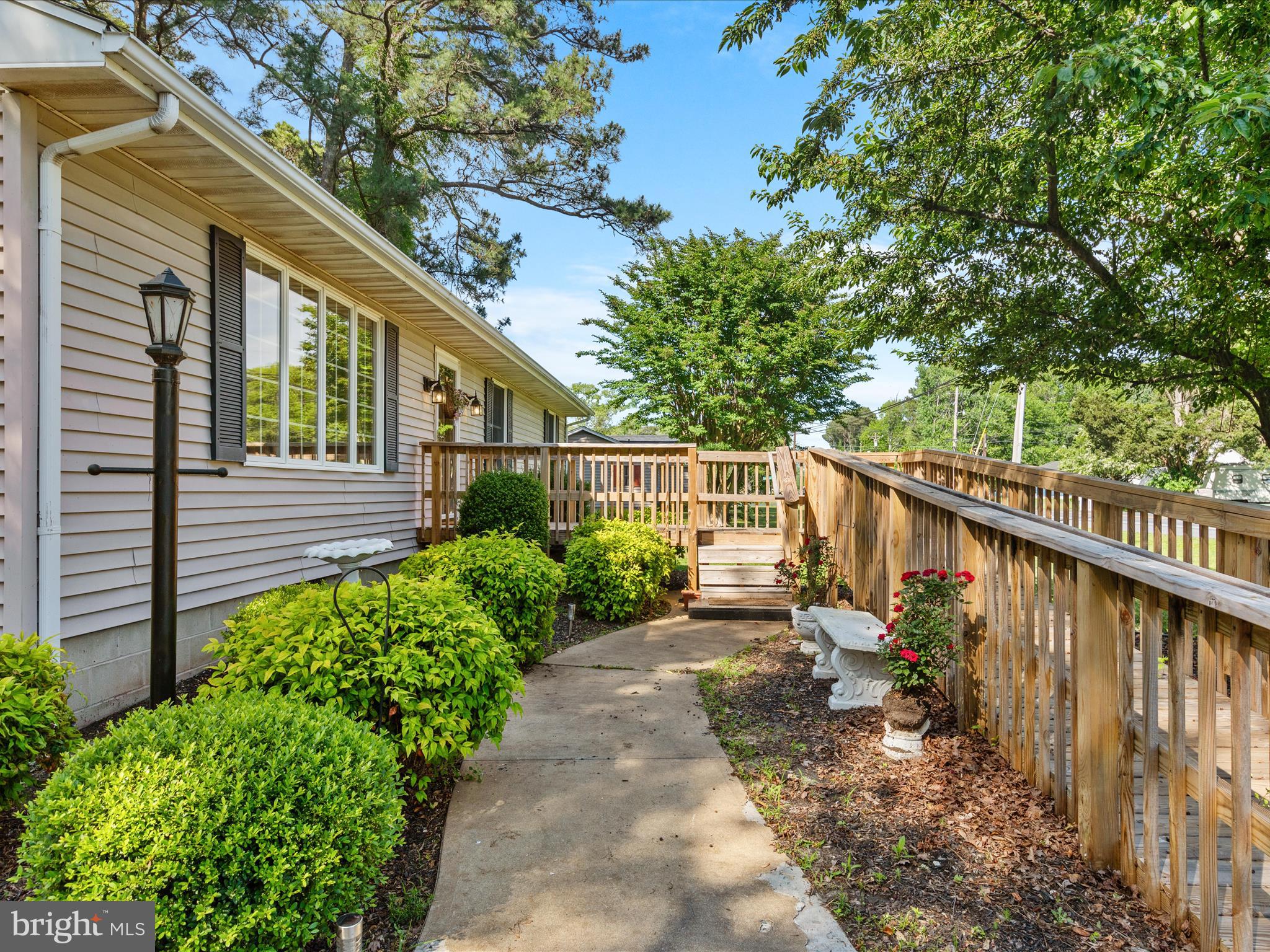 23488 Deal Island Road Deal Island, MD 21821 - Photo 43 of 52 a view of a pathway with a house in the background