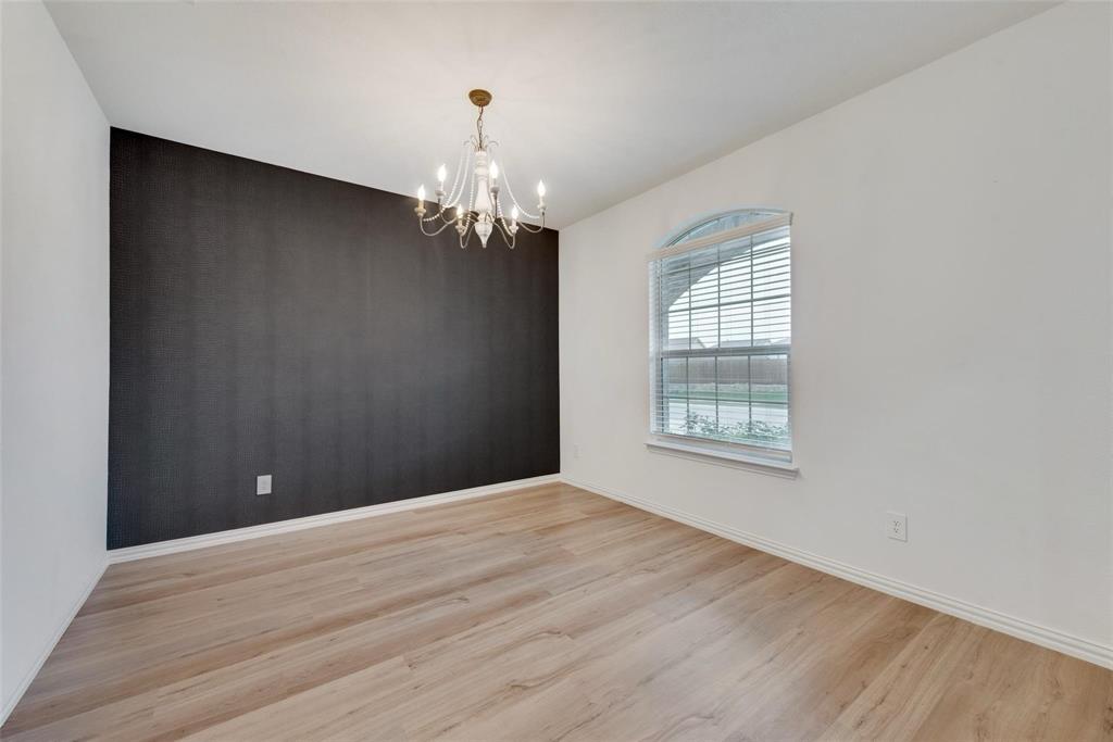 1108 Rumble Drive Fate, TX 75087 - Photo 3 of 12 a view of empty room with wooden floor