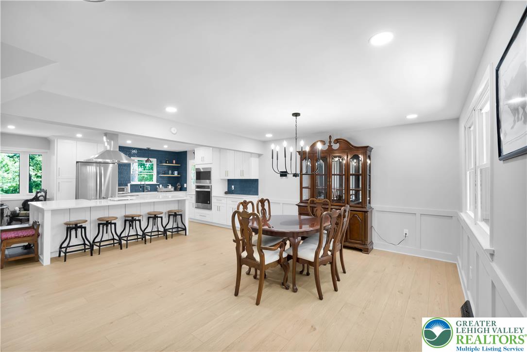 2011 Greenwood Road Allentown, PA 18103 - Photo 12 of 52 An open-concept living space integrates a chef's kitchen with a generous dining area.