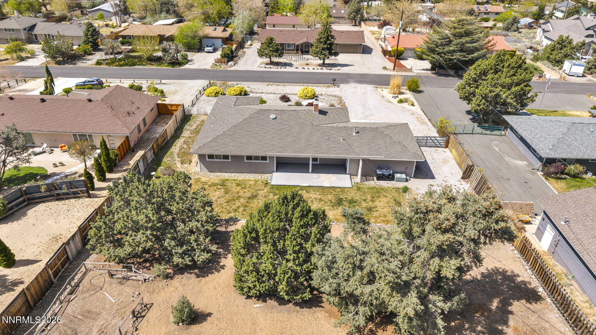 14190 Rim Rock Drive Reno, NV 89521 - Photo 66 of 68 an aerial view of a house with a swimming pool