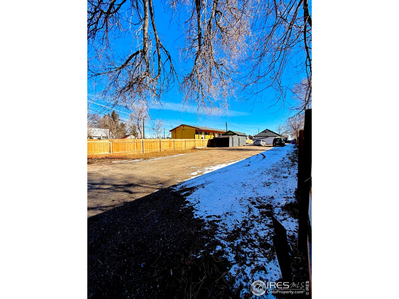 2015 5th Avenue, Unit A AND B Greeley, CO 80631 - Photo 13 of 15 a view of a backyard of the house