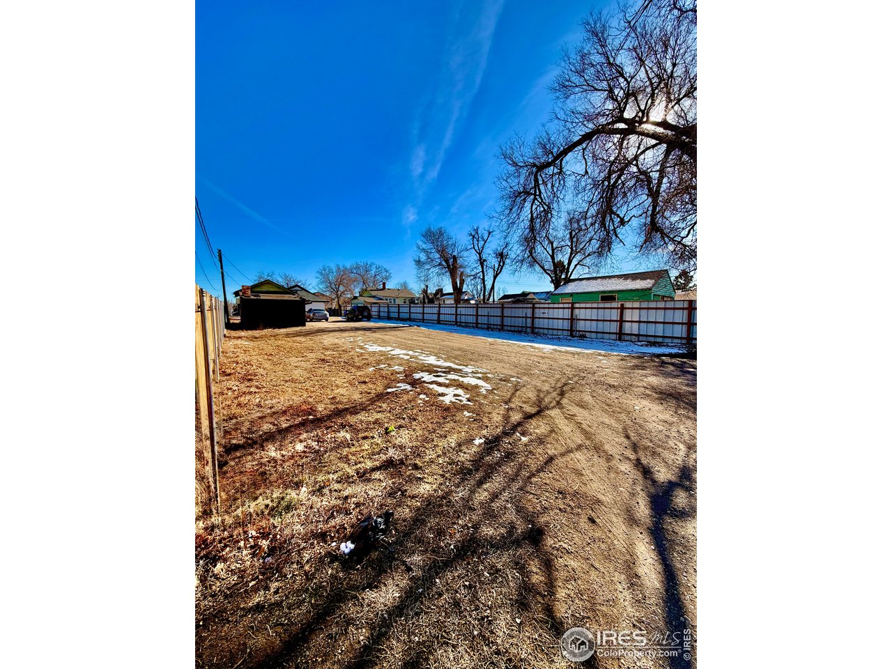2015 5th Avenue, Unit A AND B Greeley, CO 80631 - Photo 15 of 15 a view of a backyard of the house