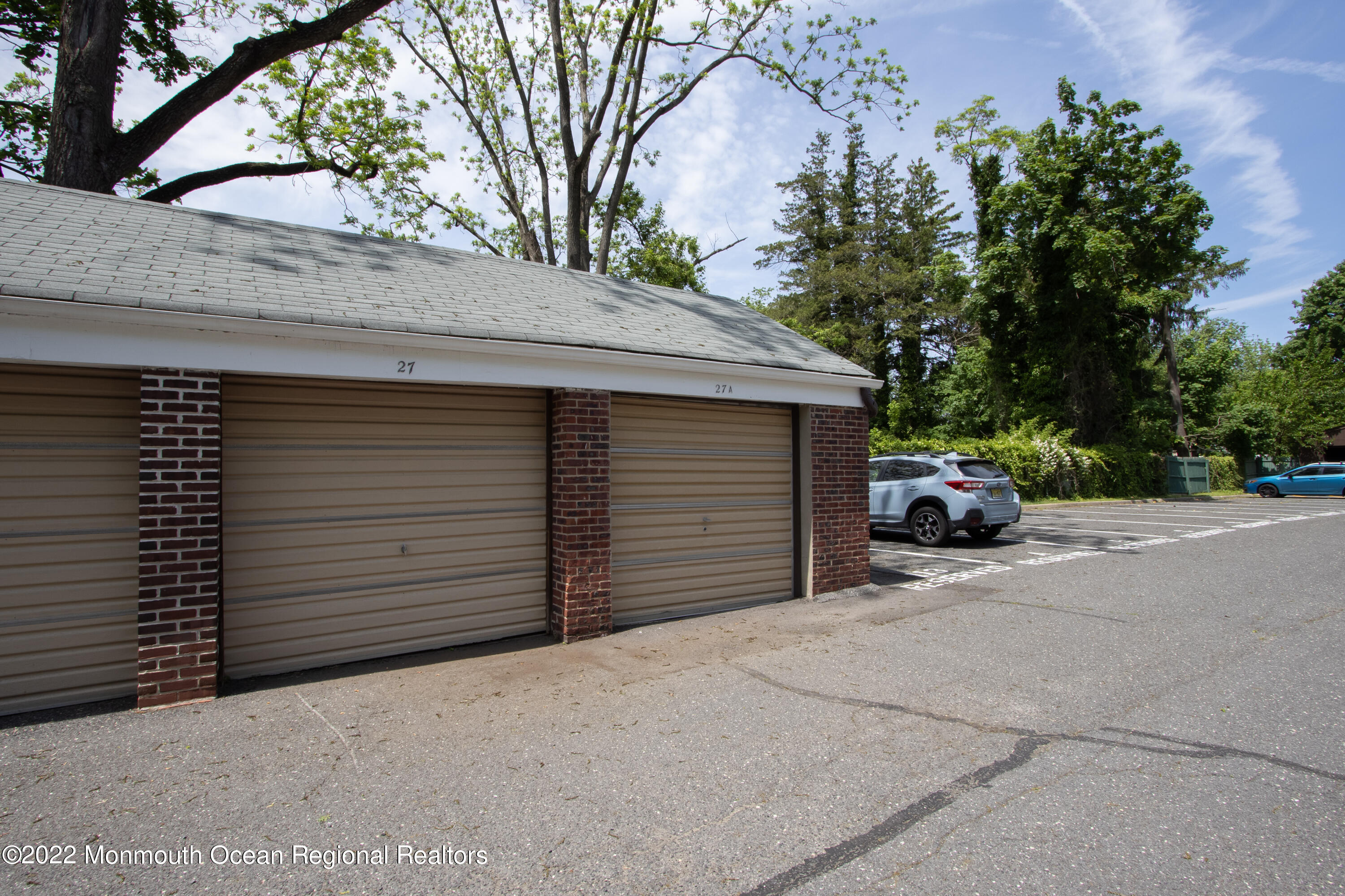27 Manor Drive Red Bank, NJ 07701 - Photo 17 of 17 a view of a car garage of the house