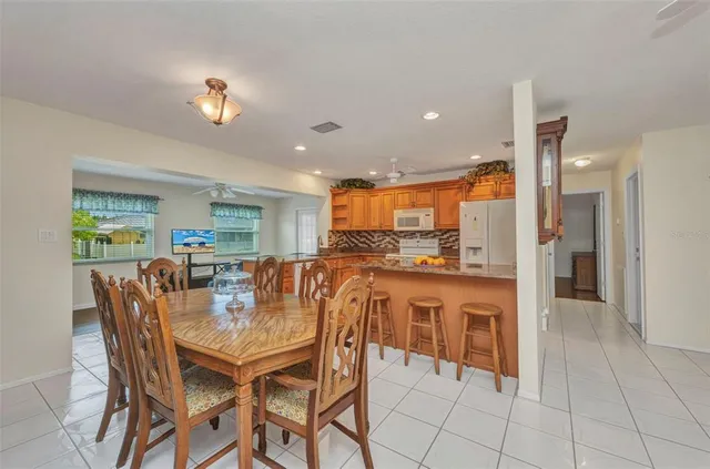 a view of a dining room kitchen and a window