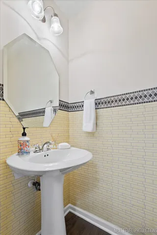 a bedroom with a bed and a chair