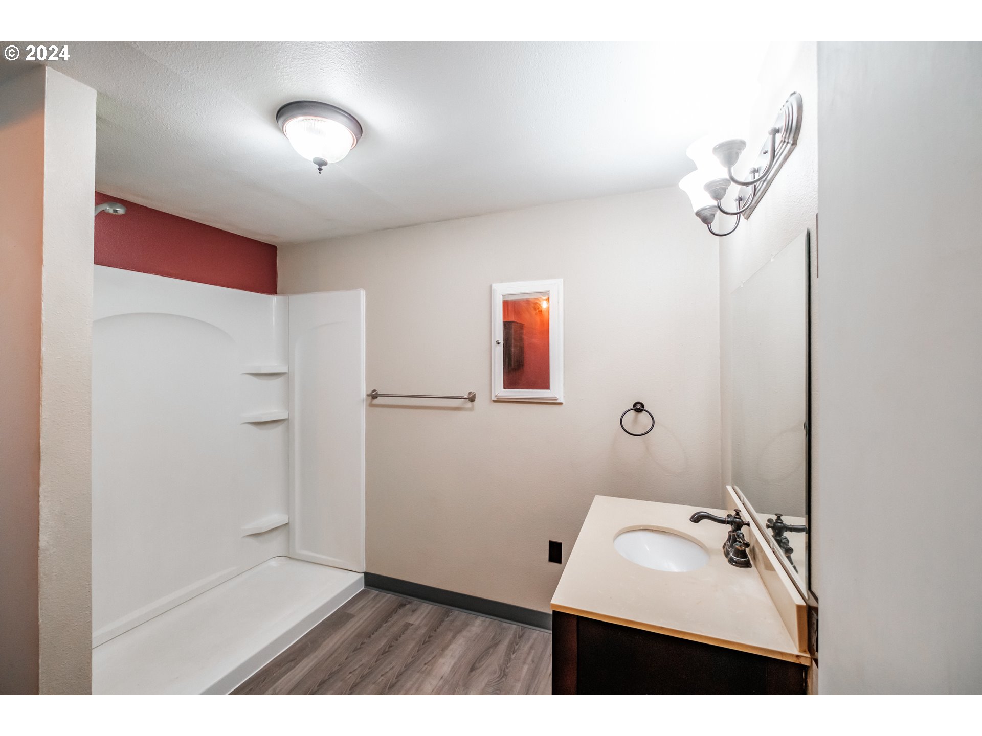 3725 Cordon Road Northeast Salem, OR 97305 - Photo 5 of 15 a bathroom with a sink and a mirror