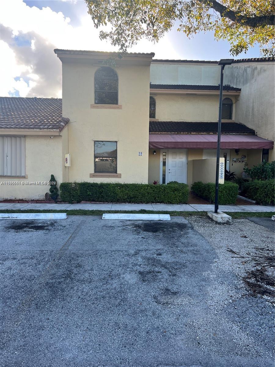 2050 Southwest 122nd Avenue, Unit 22 Miami, FL 33175 - Photo 24 of 24 a front view of house with yard