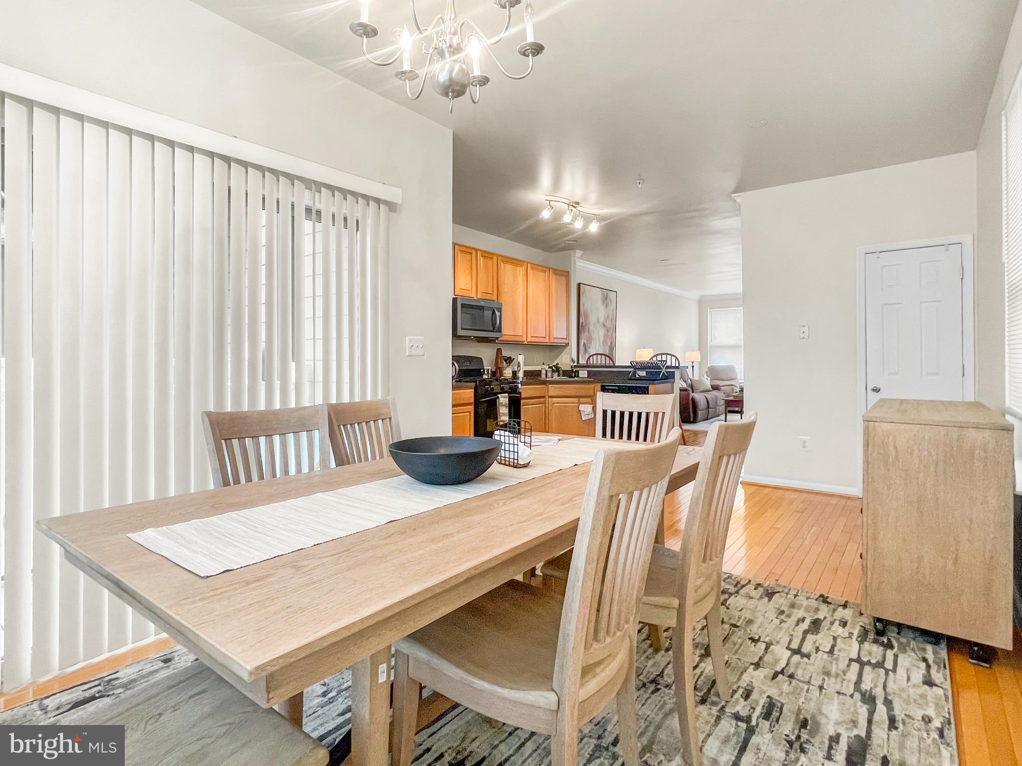 12 South Exeter Street, Unit 140 Baltimore, MD 21202 - Photo 12 of 30 a view of a dining room with furniture