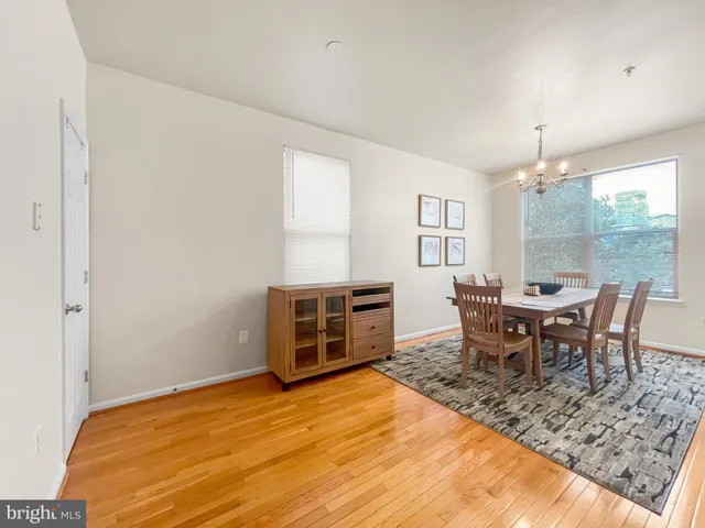 a view of bathroom with a toilet sink and mirror