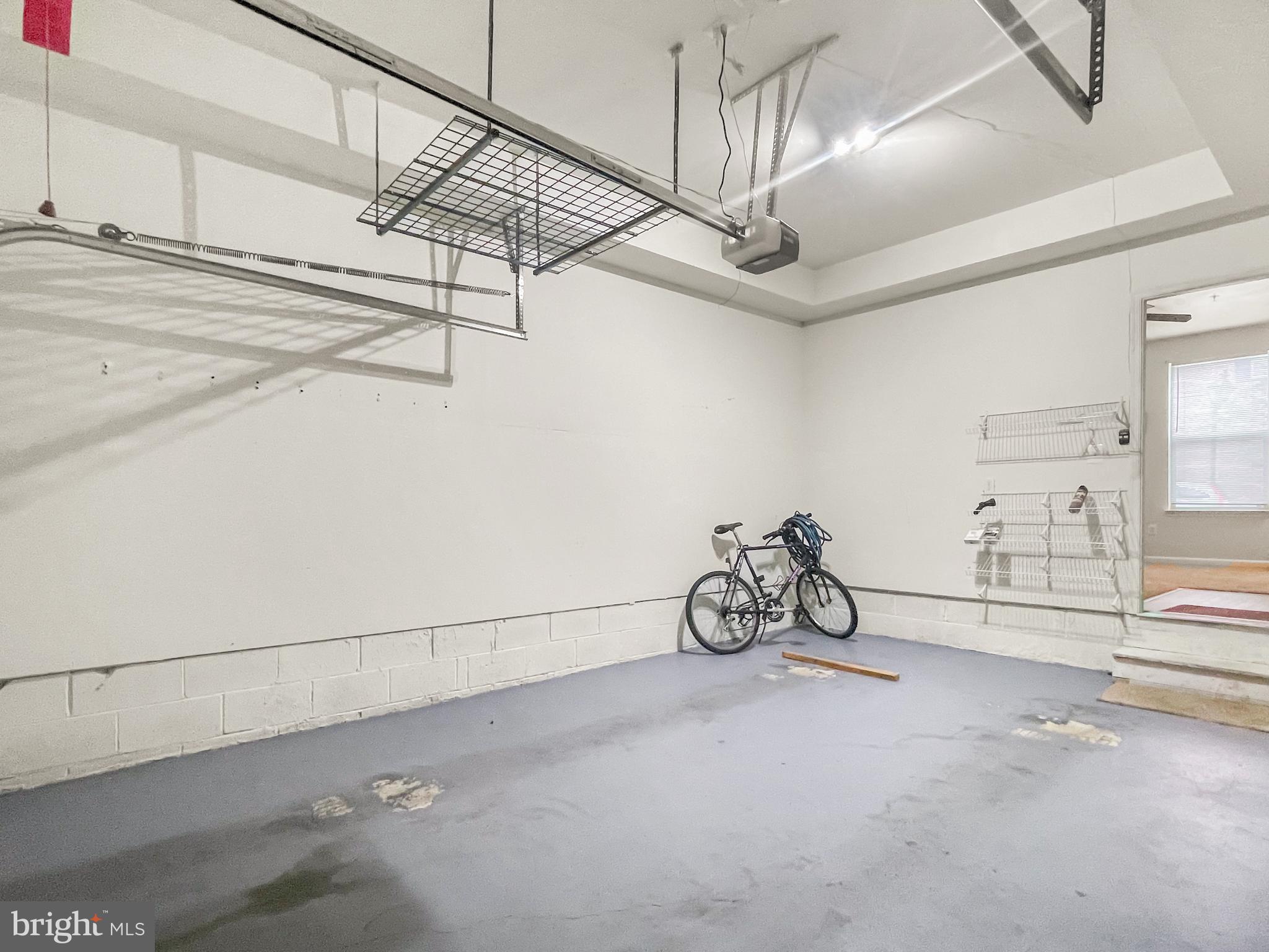 12 South Exeter Street, Unit 140 Baltimore, MD 21202 - Photo 28 of 30 a view of a room with racks on the wall