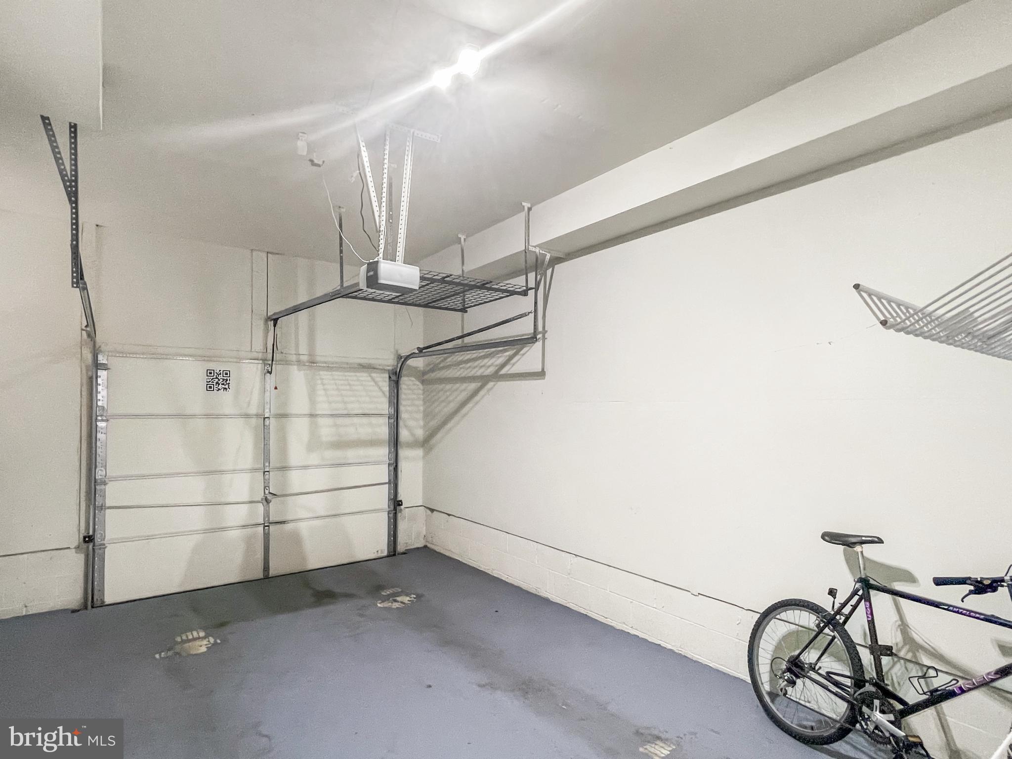 12 South Exeter Street, Unit 140 Baltimore, MD 21202 - Photo 29 of 30 a view of a garage with rack on the wall