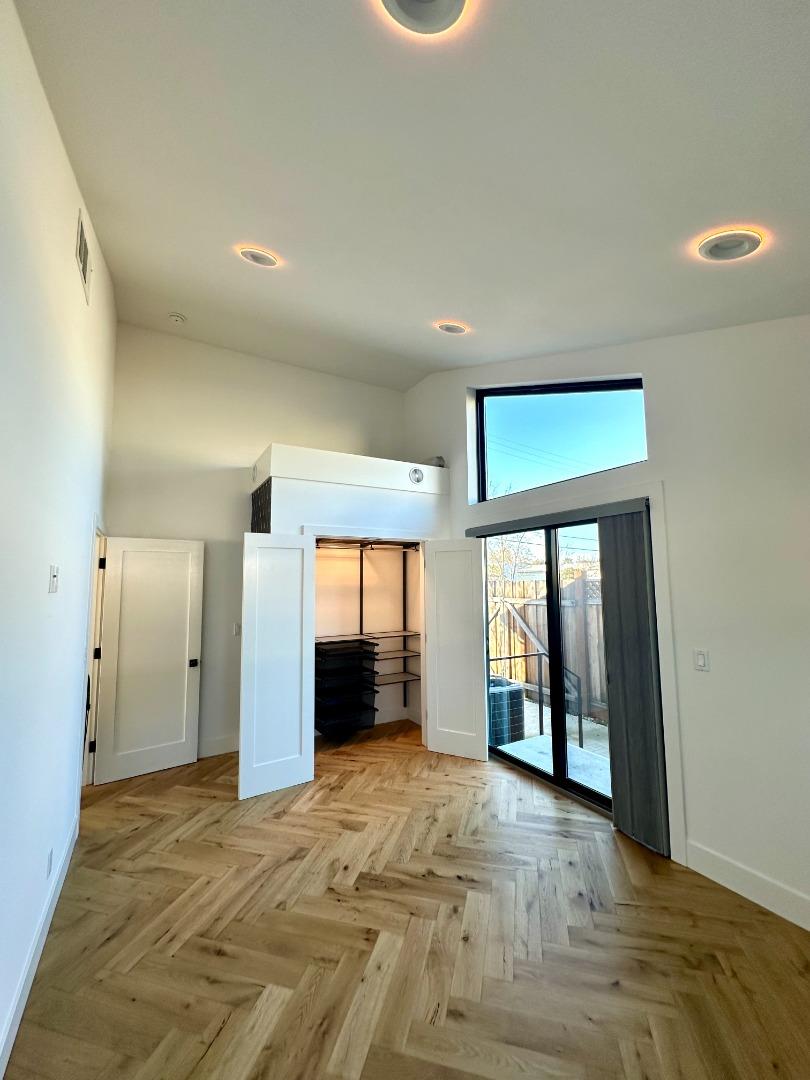 1092 Washington Street Mountain View, CA 94043 - Photo 19 of 32 a view of an empty room and window