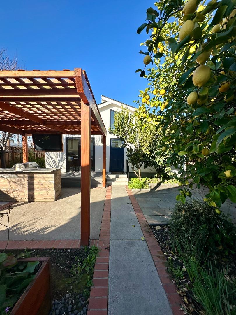 1092 Washington Street Mountain View, CA 94043 - Photo 2 of 32 a view of a patio with table and chairs and potted plants