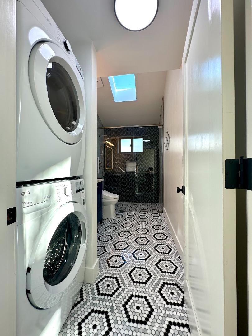 1092 Washington Street Mountain View, CA 94043 - Photo 29 of 32 a view of a hallway with washer and dryer