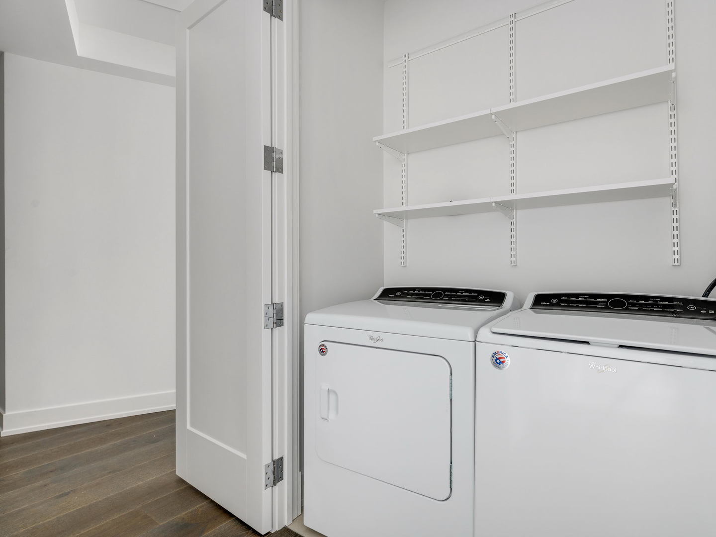 2 West Delaware Place, Unit 2802 Chicago, IL 60610 - Photo 10 of 22 a utility room with dryer and washer