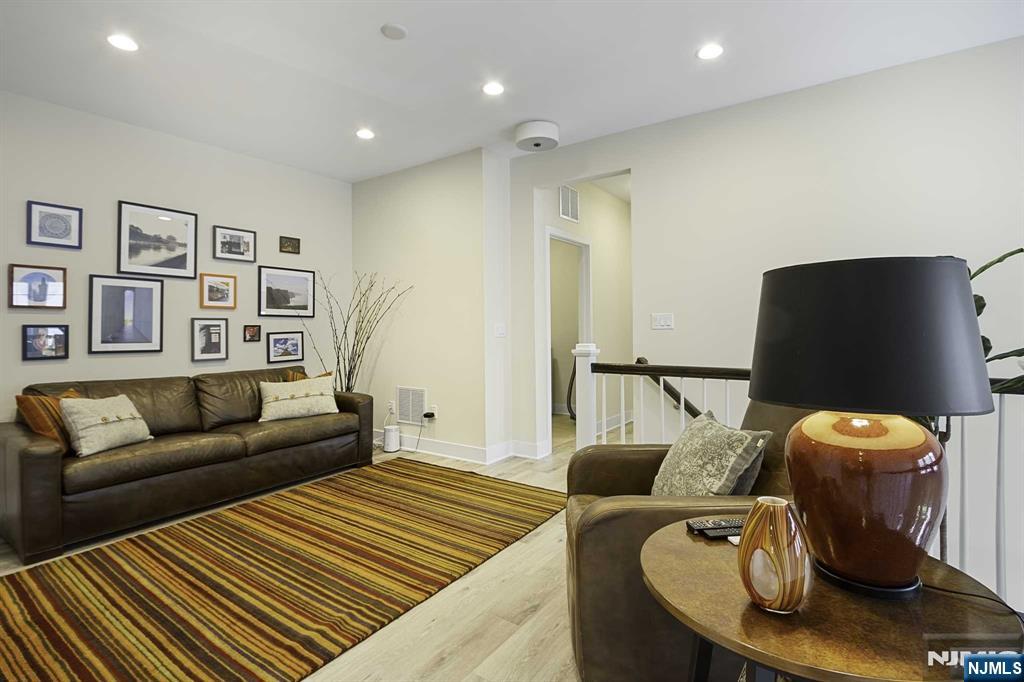 10 Aspen Drive Cedar Grove, NJ 07009 - Photo 16 of 43 a living room with furniture
