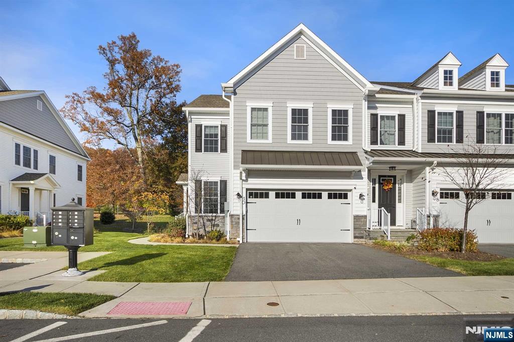 10 Aspen Drive Cedar Grove, NJ 07009 - Photo 3 of 43 a front view of a house with a yard