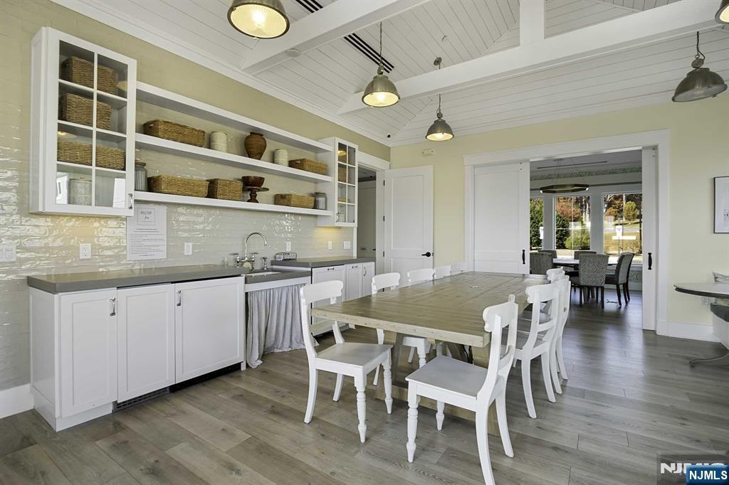 10 Aspen Drive Cedar Grove, NJ 07009 - Photo 34 of 43 a view of kitchen with granite countertop window dining table and chairs