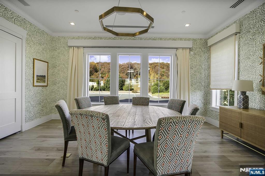 10 Aspen Drive Cedar Grove, NJ 07009 - Photo 35 of 43 a view of a dining room with furniture window and outside view