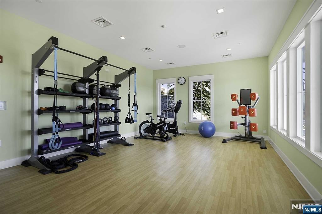 10 Aspen Drive Cedar Grove, NJ 07009 - Photo 37 of 43 a view of a room with gym equipment