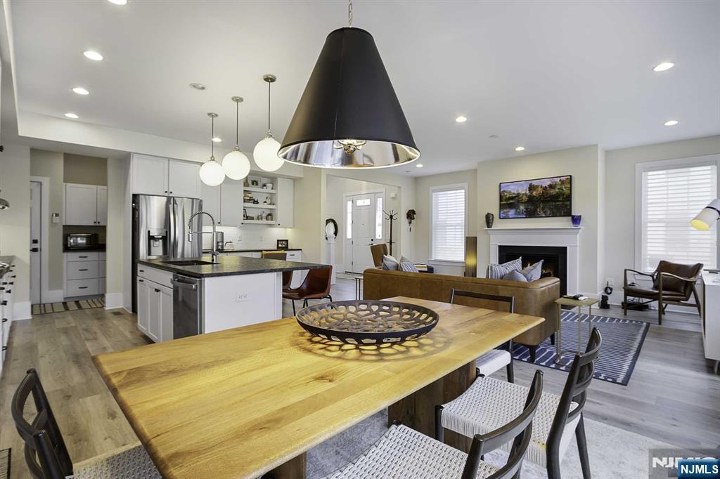 10 Aspen Drive Cedar Grove, NJ 07009 - Photo 9 of 43 a kitchen with a table and chairs in it