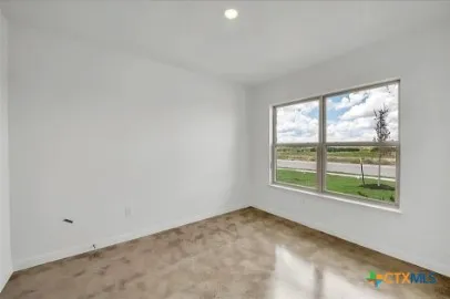 an empty room with a window