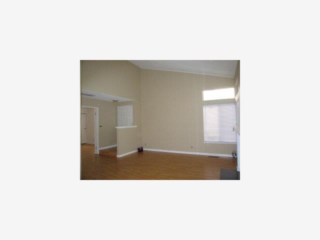 314 Moretti Lane Milpitas, CA 95035 - Photo 4 of 9 a open living room with a bench and more cabinets