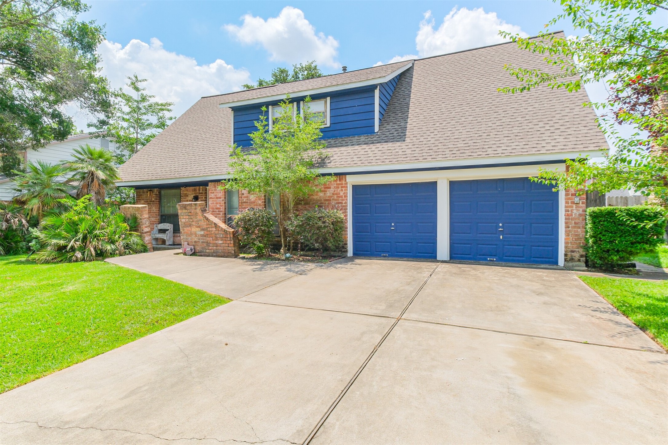 12207 Level Run Street Meadows Place, TX 77477 - Photo 3 of 44 a front view of house with yard