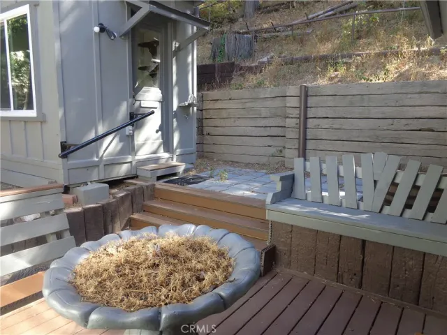 a view of balcony with wooden floor