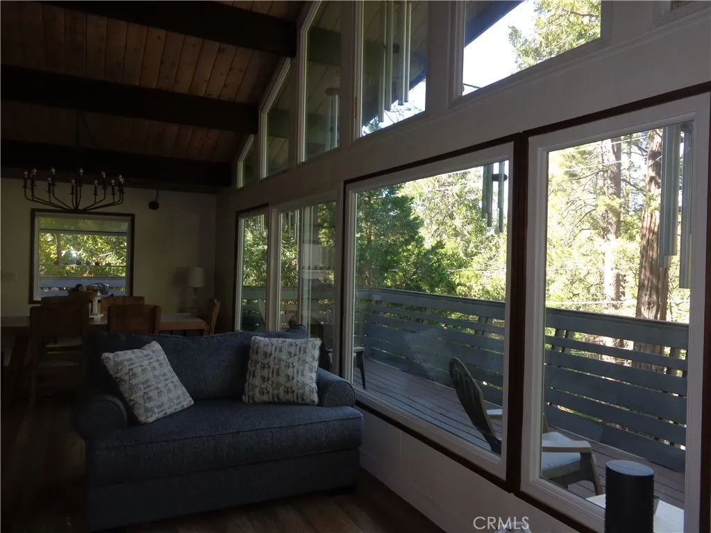 24273 Horst Drive Crestline, CA 92325 - Photo 25 of 34 a living room with large windows