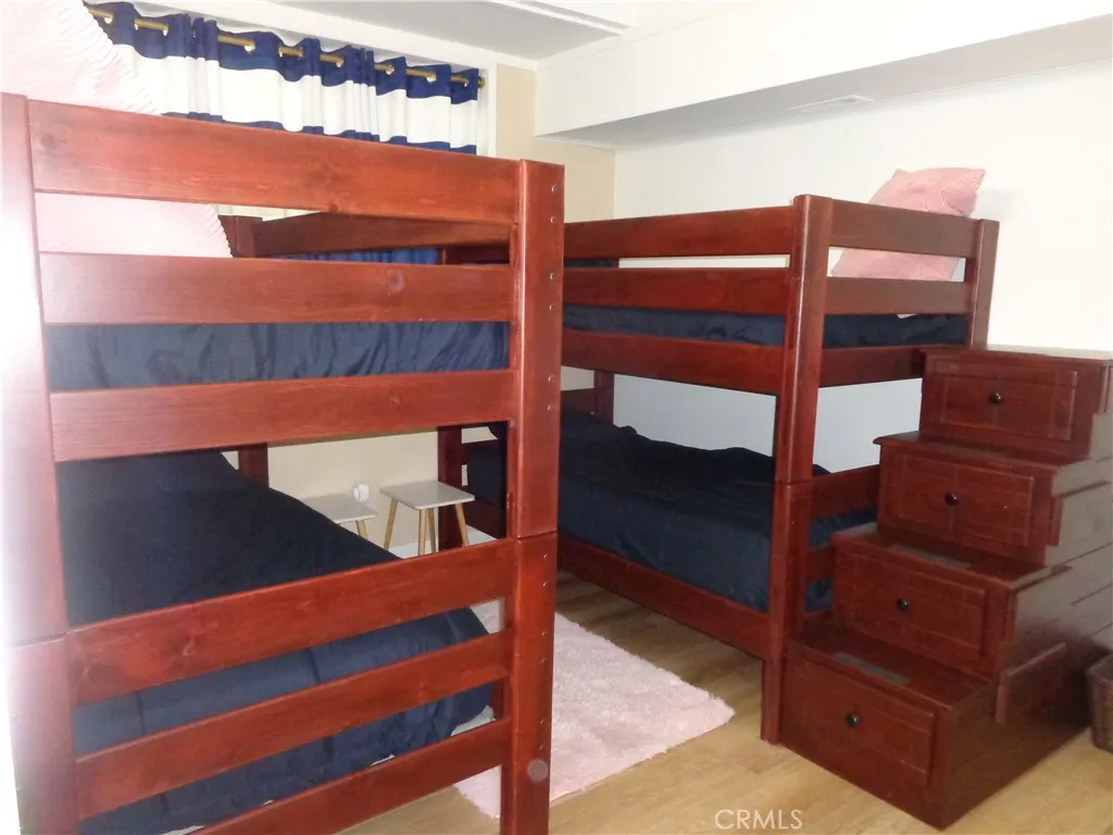 24273 Horst Drive Crestline, CA 92325 - Photo 10 of 34 a view of walk in closet and bedroom