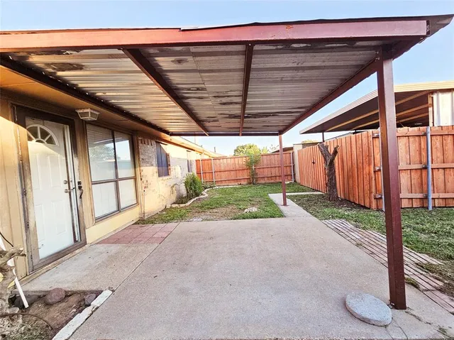 a view of a small wooden wall