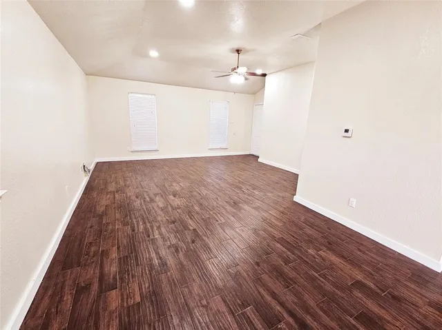 wooden floor in a hall with an entryway