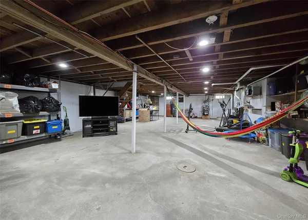 a view of parking garage with cars