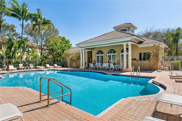 a view of a house with a swimming pool
