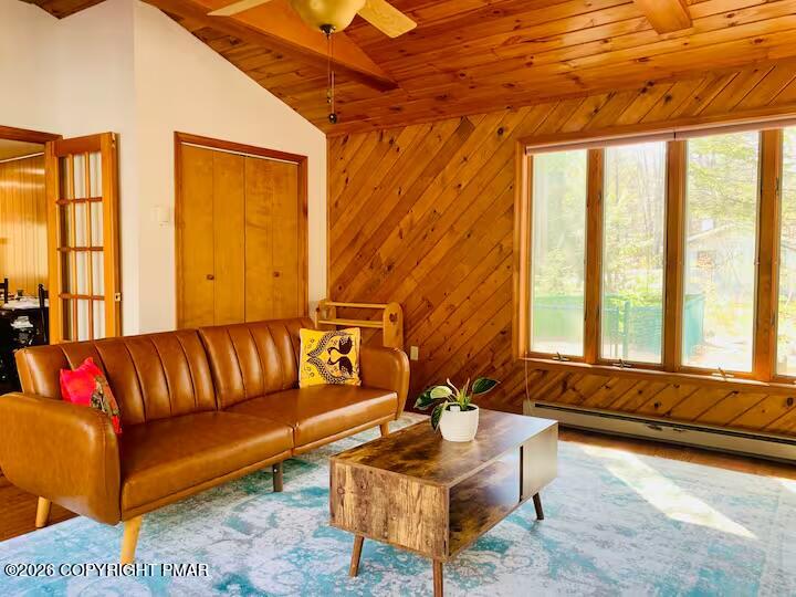 2317 Locust Ridge Road Pocono Lake, PA 18347 - Photo 10 of 49 a living room with furniture and a bathtub