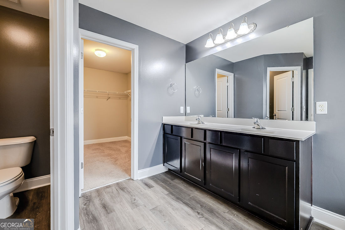 4 Bridlington Way Savannah, GA 31407 - Photo 22 of 38 a bathroom with a sink and a mirror