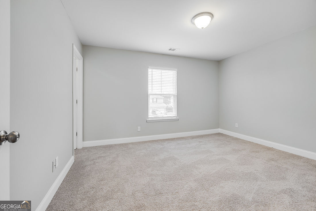 4 Bridlington Way Savannah, GA 31407 - Photo 29 of 38 an empty room with a window