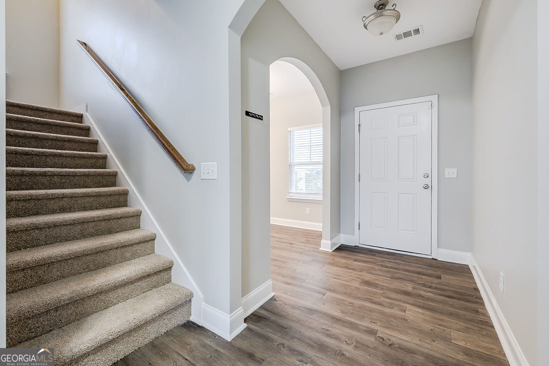 4 Bridlington Way Savannah, GA 31407 - Photo 4 of 38 a view of entryway and hall with wooden floor