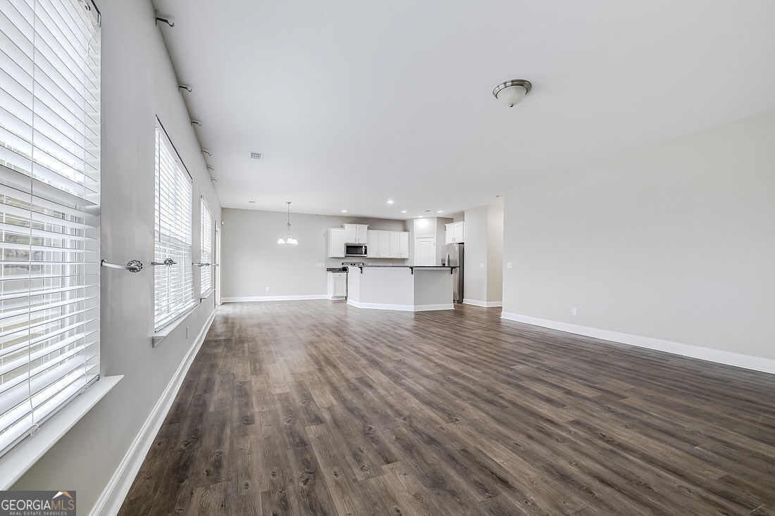 4 Bridlington Way Savannah, GA 31407 - Photo 10 of 38 a view of empty room with wooden floor and window