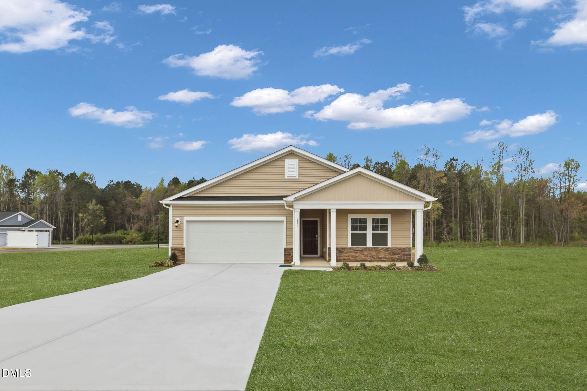 155 Digging Time Avenue Princeton, NC 27569 - Photo 2 of 29 a view of a house with a backyard