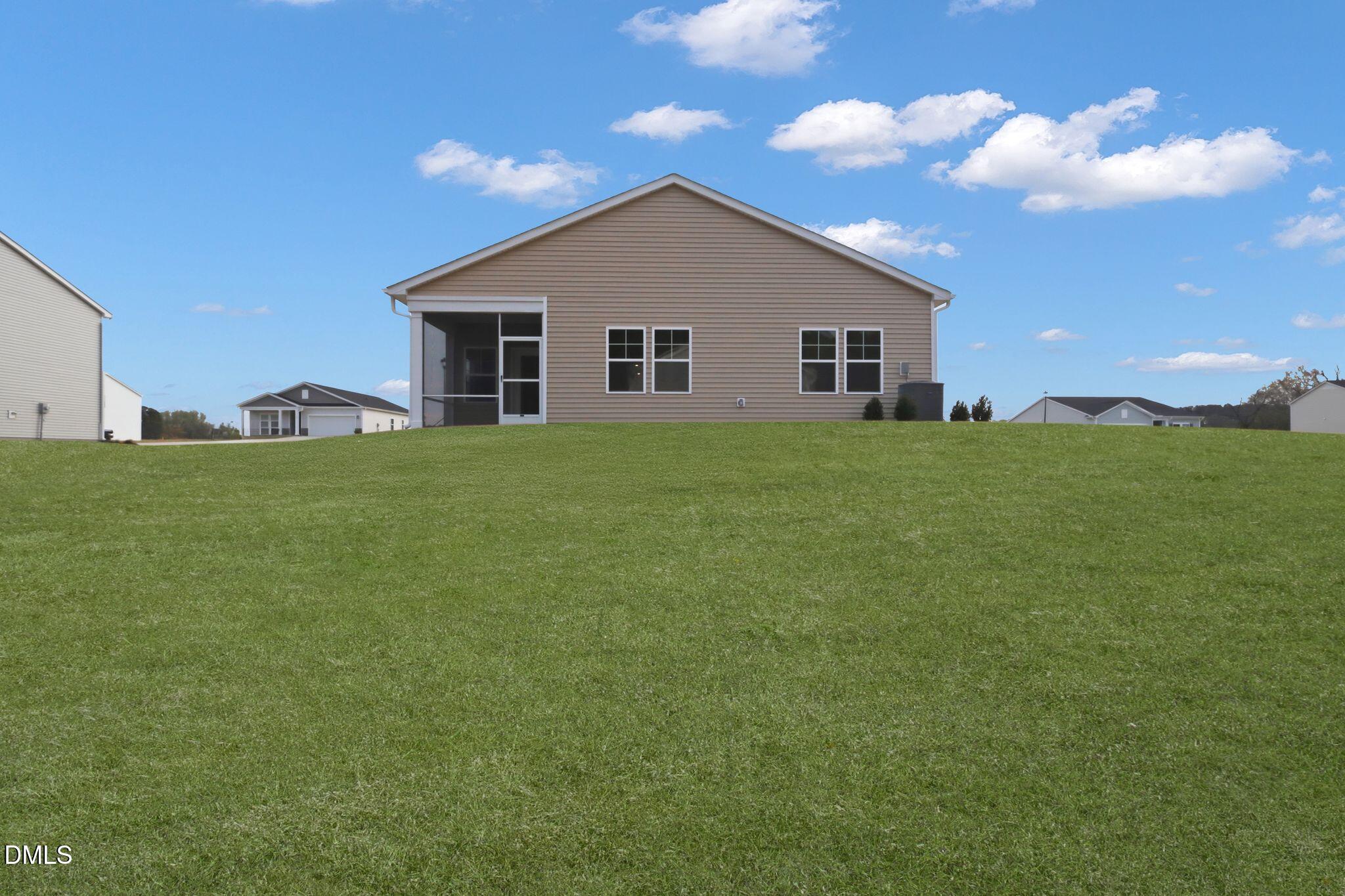 155 Digging Time Avenue Princeton, NC 27569 - Photo 26 of 29 a view of a backyard of the house